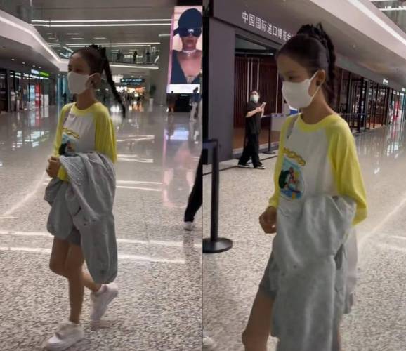 黑中长款瘦棉袄下身怎么搭配