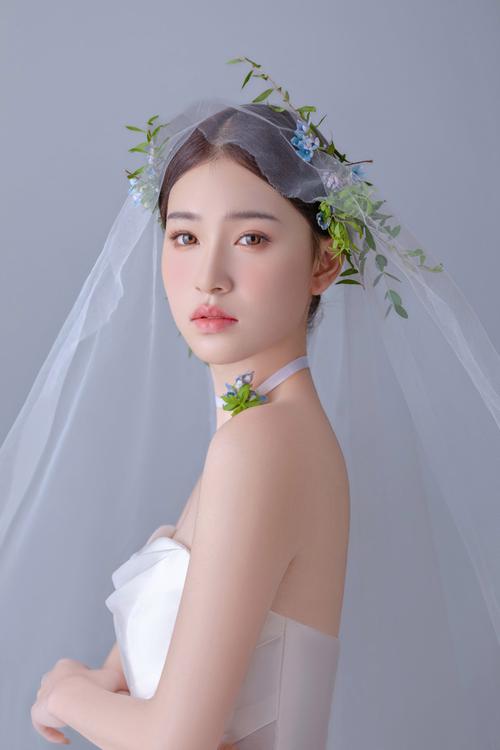 最新新娘鲜花造型图片