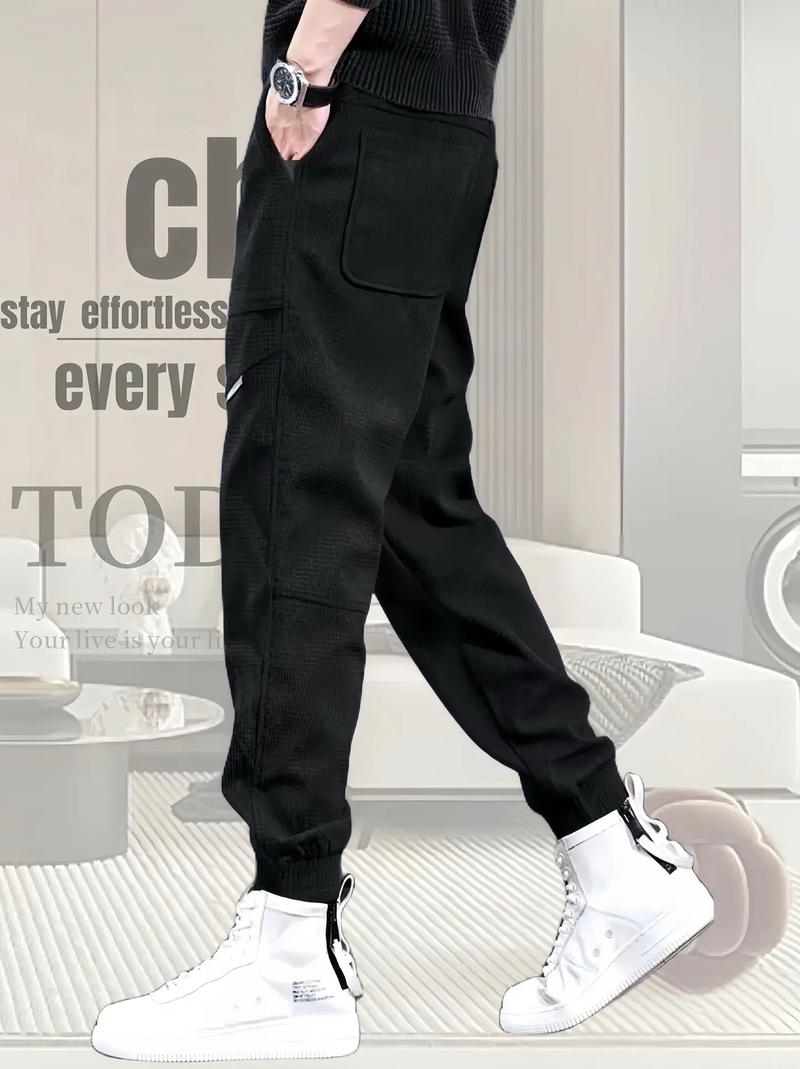 男士黑色束脚裤怎么搭配衣服