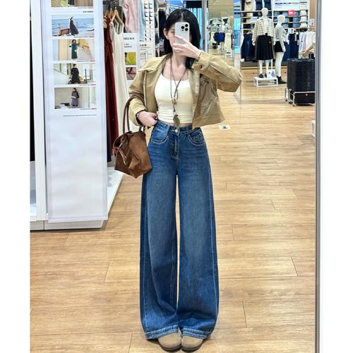 绣牛仔裤怎么搭配衣服