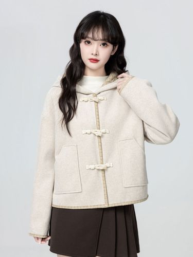 女连帽毛尼大衣怎么搭配