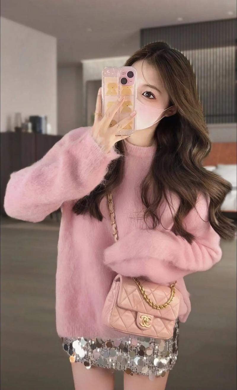 粉色毛衣配什么裙子