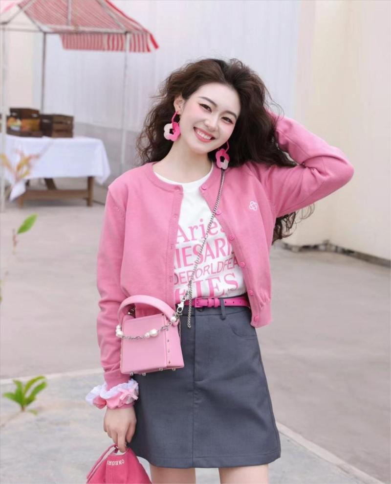 粉色毛衣配什么裙子