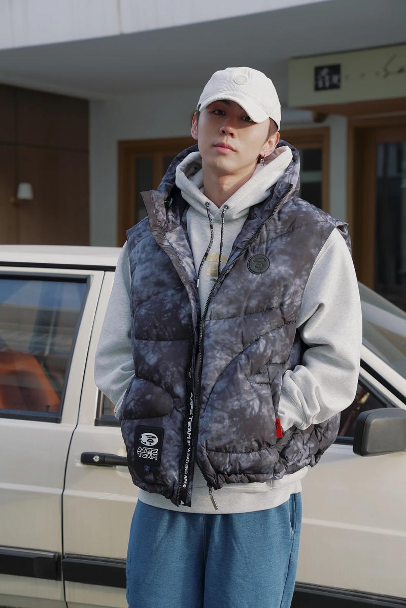 冬天穿的羽绒服马甲怎么搭配衣服好看图片