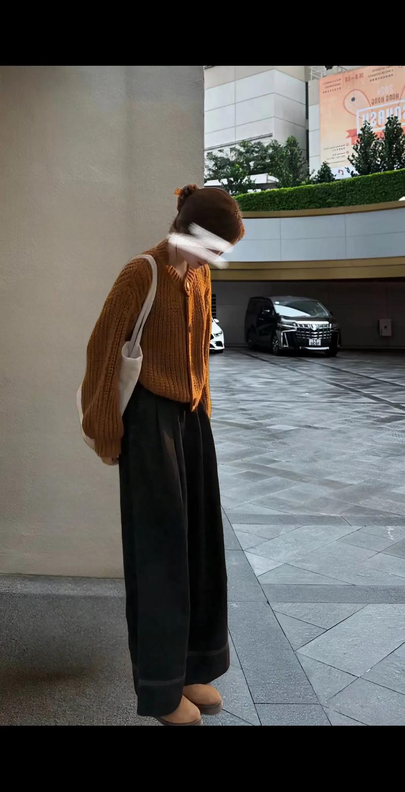 休闲女士长款开衫毛衣怎么搭配什么裤子好看