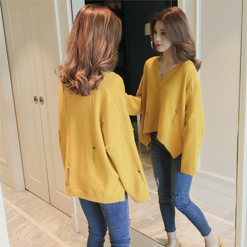 带洞毛衣怎么搭配